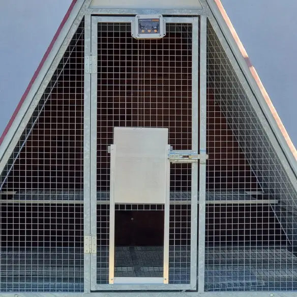 Abridor automático montado con la puerta abierta